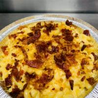 Bacon Mac & Cheese · Our classic macaroni and cheese topped with applewood smoked bacon 