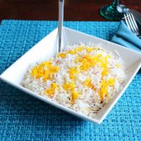 Steamed Rice · Cumin and saffron infused steamed Basmati Rice.