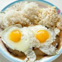 16. Loco Moco Plate · Hamburger patties over rice, covered with brown gravy and topped with eggs.