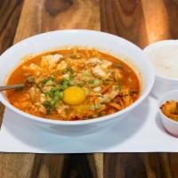 Soondubu Soup · Soft tofu soup with mixed vegetables, scrambled eggs and hot pepper powder. Served with whit...