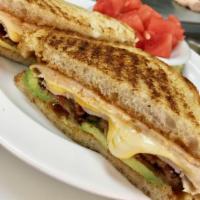 The Bloom Hot Sandwich · Turkey, bacon, provolone, cheddar, avocado, red onion and chipotle.