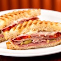 Godfather Hot Sandwich · Ham, salami, provolone, roasted red peppers, pepperoncini, Italian dressing and mayo.