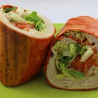 2. Turkey Wrap · 3 oz. sliced turkey, provolone cheese, lettuce, tomatoes and a touch of ranch dressing.