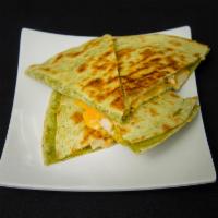 Chicken Quesadilla · Served with cheddar cheese and sour cream on the side.