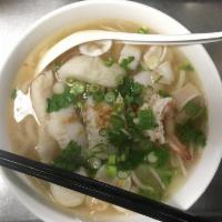 81. Seafood Noodles Soup · Shrimp, squid, imitate crab meat and fish ball.