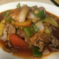 33. Sweet and Sour · Sauteed meat with bell peppers, tomatoes, cucumber, pineapple, onion and sweet and sour sauc...