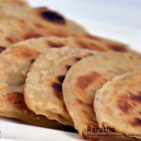 Paratha · Flatbread rolled with oil which makes this bread nice and heavy, yet crispy.