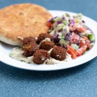 Falafel, Hummus and Salad Plate · Traditional ground chick peas, all natural herbs and spices, fried golden brown.
