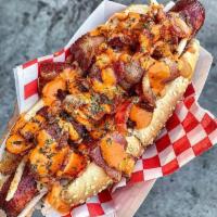 Banh Mi Hot Dog · Bacon, banh mi slaw, herb blend and sriracha aioli.