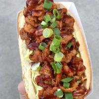 Smoked Hot Dog · Spicy ink, caramelized onions, cole slaw, cheddar and garlic aioli.