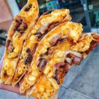 Mac and Cheese Bacon Quesadilla · Homemade creamy mac and cheese, bacon and cheddar.