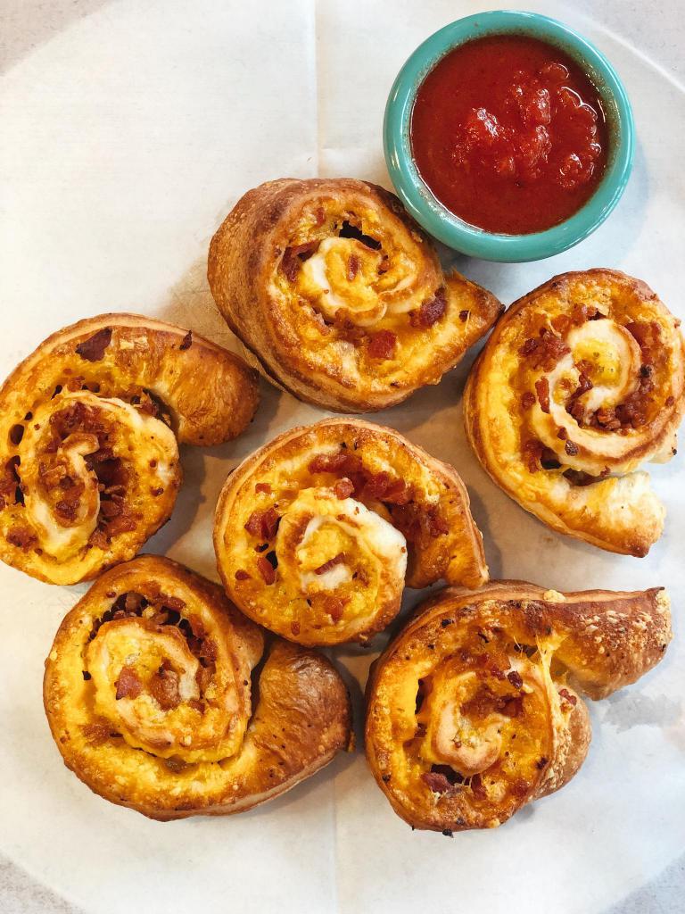 Bacon Cheddar Pinwheel · Pizza dough rolled with bacon and cheddar served with marinara sauce.