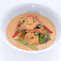 Panang Curry · Choice of meat in panang curry paste with basil, bell peppers and peas. Spicy.