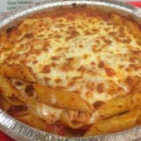 04. Baked Penne Rigate · A tubular pasta sauteed with marinara sauce and a touch of cream sauce, topped with mozzarel...