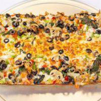 Veggie Delight Pizza · Premium mozzarella, mushrooms, red and green peppers, onion, spinach, black olives and tomat...