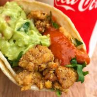 Chicken Taco · Prepared with corn tortilla, cilantro, onions and salsa.