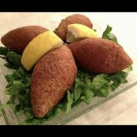Kebbeh · Fried ground meat and burghul shell stuffed with ground meat, onions and pine nuts. 