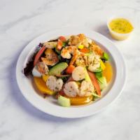 Grilled Shrimp and Scallop Citrus Salad · Grilled seafood, mixed greens, avocado, tomato, mango, orange, cucumber and citrus vinaigret...