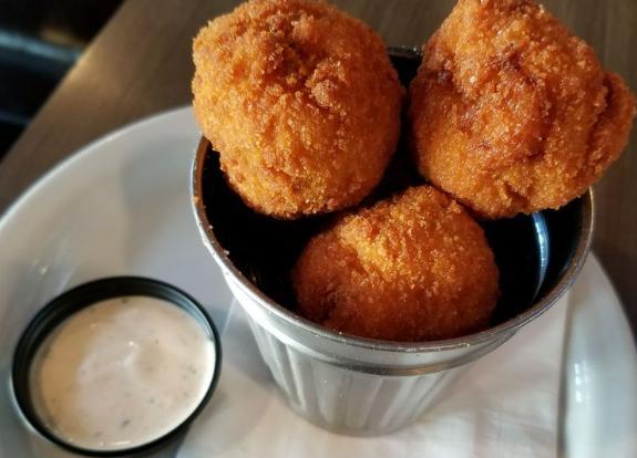 Fried Bacon Mac and Cheese Balls · House-made bacon mac and cheese balls, breaded with panko and served with Tapatio ranch