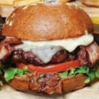 Bison and Bacon Burger · American ranch bison, thick-cut bacon, Swiss, Jalapeno bacon jam, tomato, green leaf lettuce...