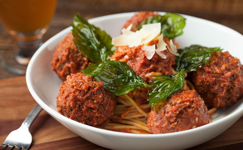 Slater's Spaghetti and Bacon Meatballs · House made 50/50 bacon beef meatballs, shaved Parmesan and basil on a mountain of spaghetti, tossed with slow cooked spicy marinara sauce.