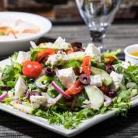Mediterranean Salad · Feta cheese, lettuce, green pepper, tomato, cucumber, onion, olives, mint and lemon.