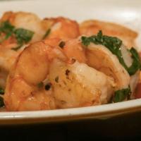 Gambas · Sauteed shrimp in olive oil, garlic, cilantro, and arak.