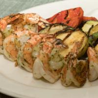 Shrimp Kebabs · Grilled shrimp and vegetables with salad.