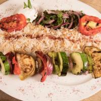 Veggie Kebabs · Grilled mushrooms, onion, squash, eggplant, tomato, pepper and rice.