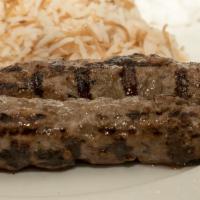 Kafta Kebabs · Ground lamb and beef, sumac onion, garlic whip and rice.