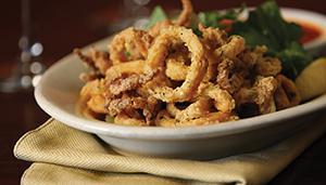 East Cost Calamari Fritti · Tender calamari seasoned with salt and pepper, lightly fried. Served with Russo's homemade m...