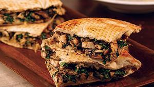 Chicken Portobella Sandwich · Grilled chicken, sauteed spinach, portabella mushrooms, Sicilian extra virgin olive oil, gar...