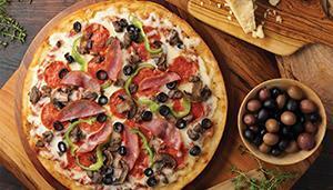 New York Village Pizza · Crumbled Italian sausage, pepperoni, Canadian bacon, beef, mushrooms, black olives, roasted ...
