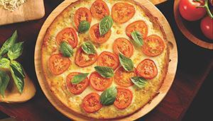 Margherita Pizza · Roma tomatoes, fresh basil, garlic, Wisconsin mozzarella cheese, and Sicilian extra virgin o...