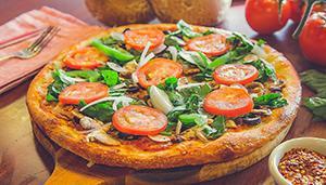Vegetarian Pizza · Fresh spinach, bell peppers, black olives, white onions, Roma tomatoes, mushrooms, garlic an...