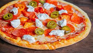 Doppio Pepperoni Neapolitan Pizza · Large thin crust square pizza. Jalepeno peppers, double pepperoni, ricotta cheese, Russo's p...