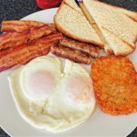 American Breakfast · Your choice of toast, bacon, sausage, 2 eggs any style, Hash Brown