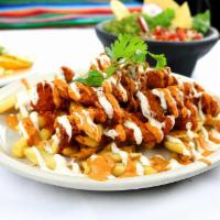 Buffalo Fries · French fries topped with delicious spicy buffalo chicken tenders, chipotle sauce and ranch