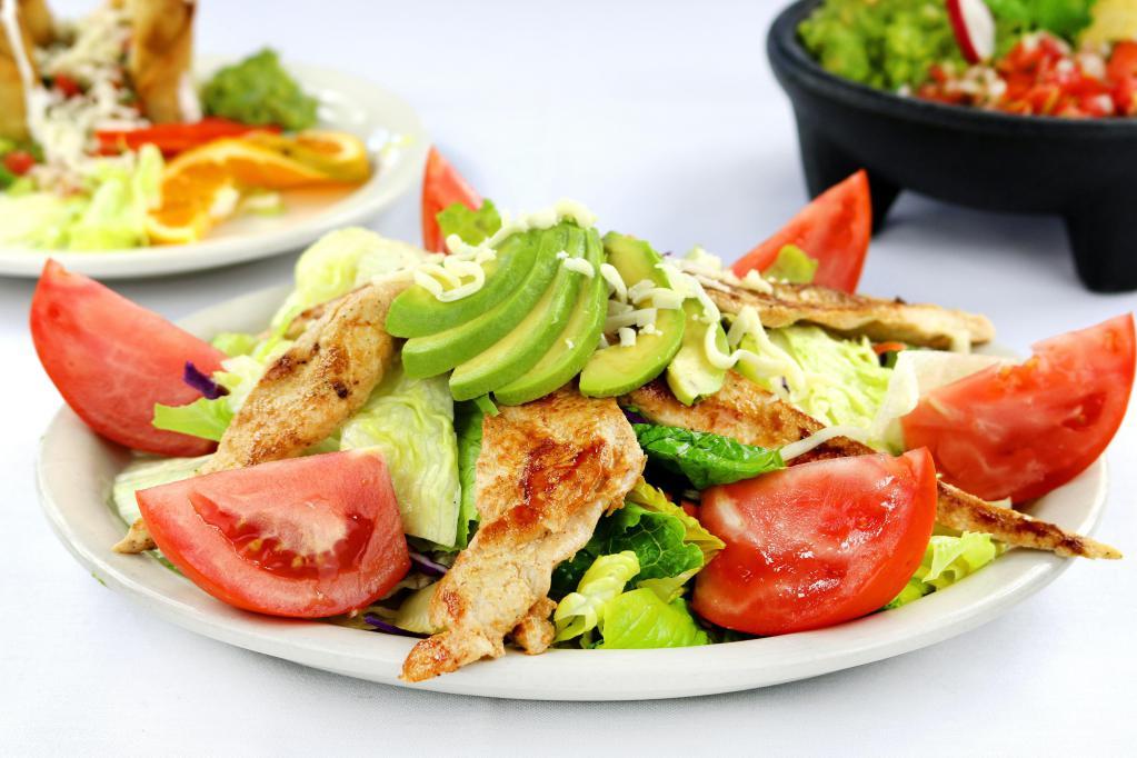Chicken Salad · Mixed greens, carrots, cucumber, cabbage, cheese, tomatoes and avocado