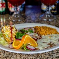 Combo #7 Crispy Taco & Enchilada · Your choice of One crispy taco and One enchilada. Served with two sides.