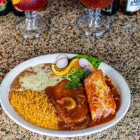 Combo #10 Tamal & Chile Relleno · One chicken tamale topped with red sauce & cheese and One chile relleno. Served with two sid...