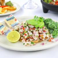 Ceviche de Camaron · A blend of fresh shrimp, onions, cilantro, tomatoes and cucumber. Cooked in fresh lime juice...
