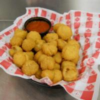 Breaded Mushrooms · Mushrooms coated in breadcrumbs and then baked or fried. Served with a side of ranch.