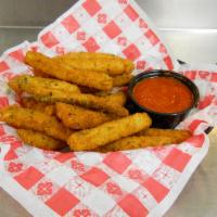Zucchini Sticks · Sliced zucchini, breaded, and baked or fried. Served with a side of ranch.