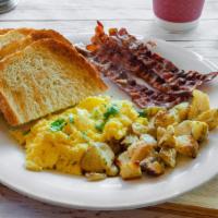 Morning Classic · Scrambled eggs, choice of breakfast meat,herb roasted potatoes and your choice of toast.