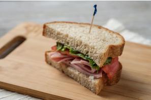 All Natural Savory Ham Sandwich · On honey wheat. Includes mayonnaise, spicy mustard, tomato, lettuce and red onion.