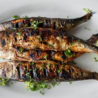 Grilled Sardines with French Fries · 