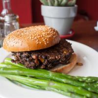 Cal-Mex Burger · Vegan with black beans, corn and spices with tomato slice and side of salsa verde. Served on...