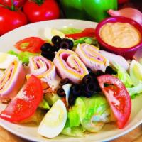 Chef Salad · Lettuce, tomatoes, hard boiled eggs, ham, turkey, olives and American cheese.