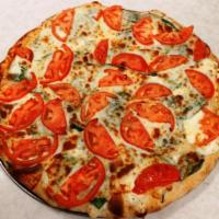 Ricotta Pizza · Fresh tomato, mozzarella, ricotta cheese and spinach. 